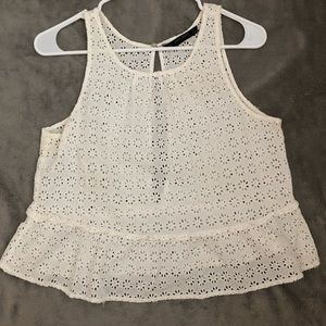 White top with floral design